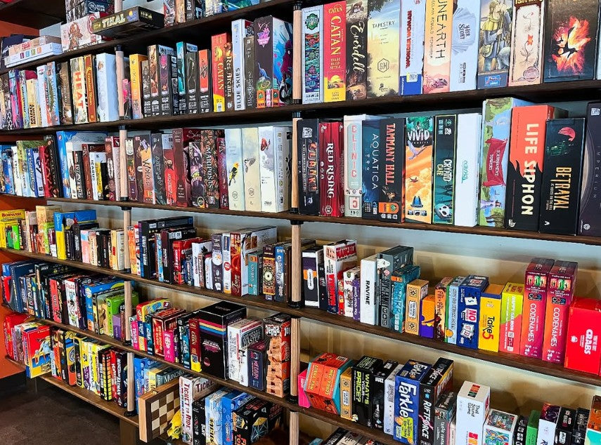 The board game shelves at Mayhem’s café